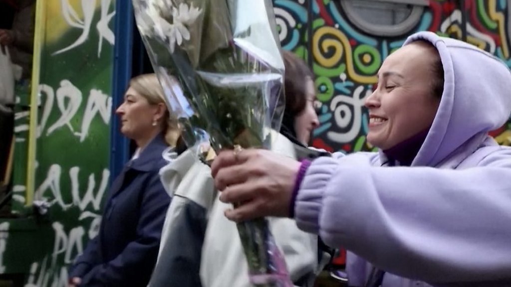 Tears as first Kyiv train arrives in freed Kherson