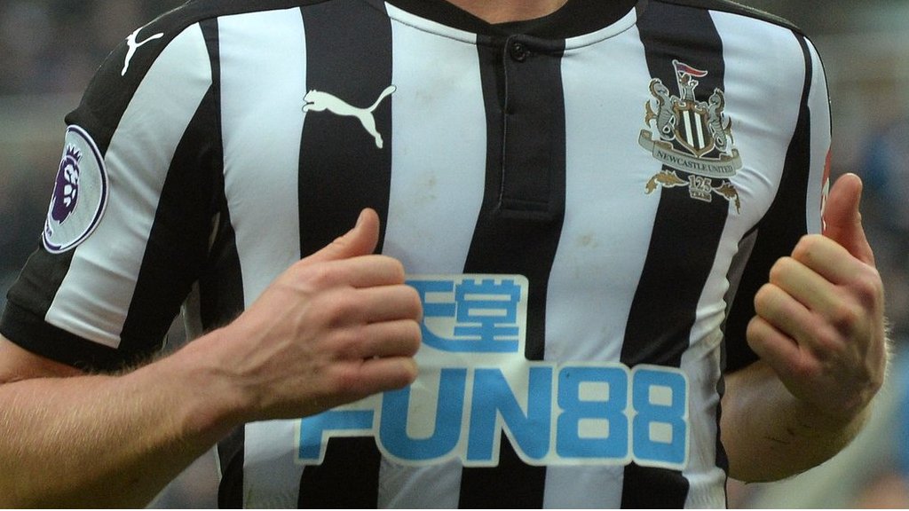 Newcastle charged over betting logo on under-18 side's shirts