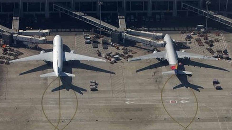 Coins thrown into plane engine by elderly passenger for 'luck'