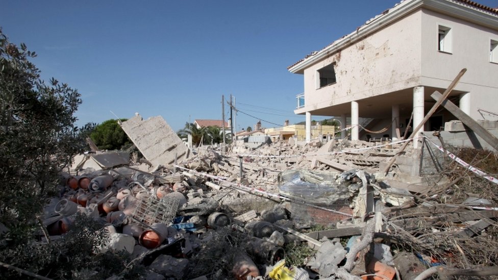 Image shows destroyed remains of a house, thought to be a bomb-making centre for the group.