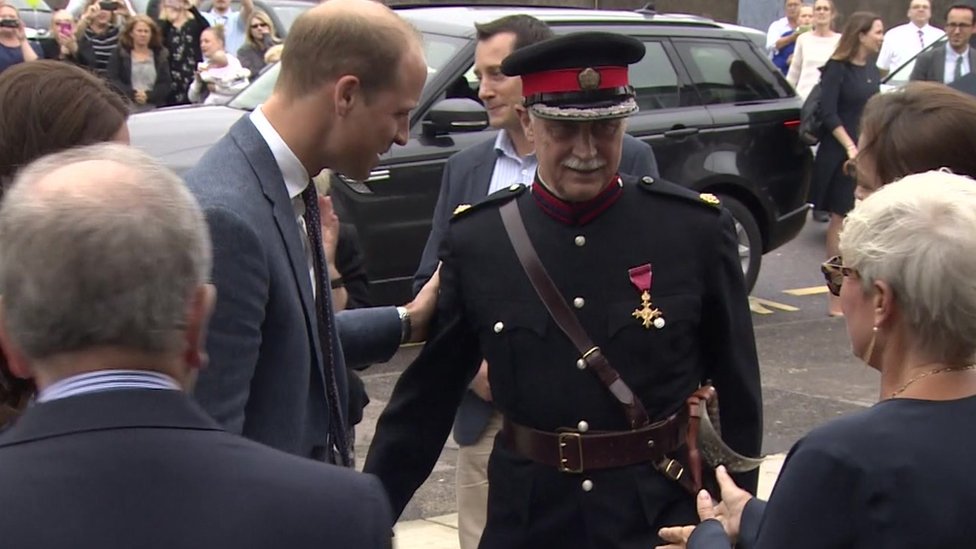 Prince William helps Essex aide as he slips on pavement