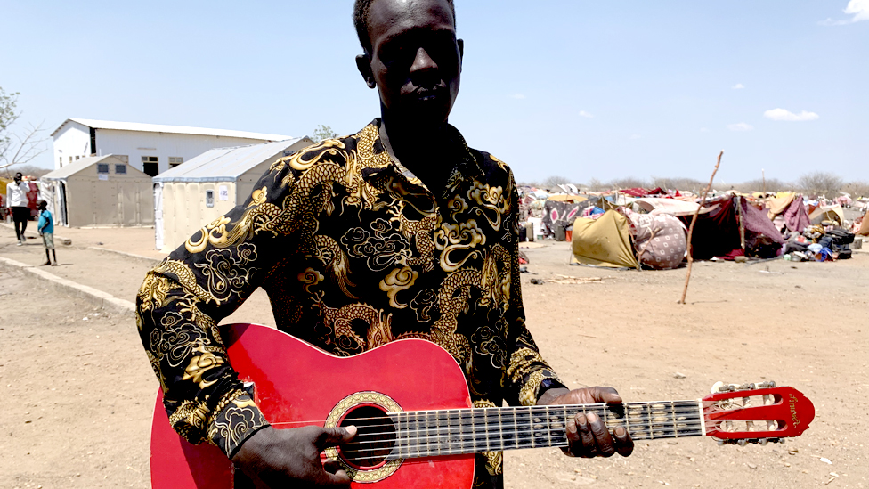 'How I saved my red guitar from Sudan's war zone'