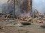 Search crew assess mill blast site