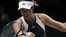 Muguruza beats Kvitova to top group