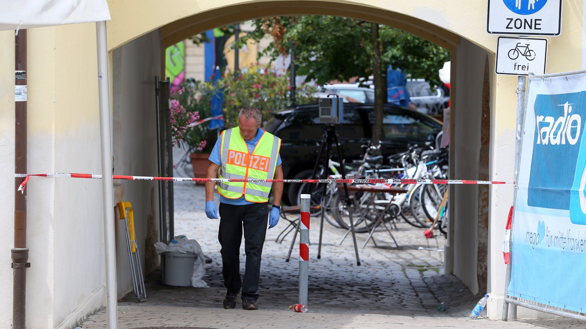 Merkel rules out migrant policy reversal after attacks