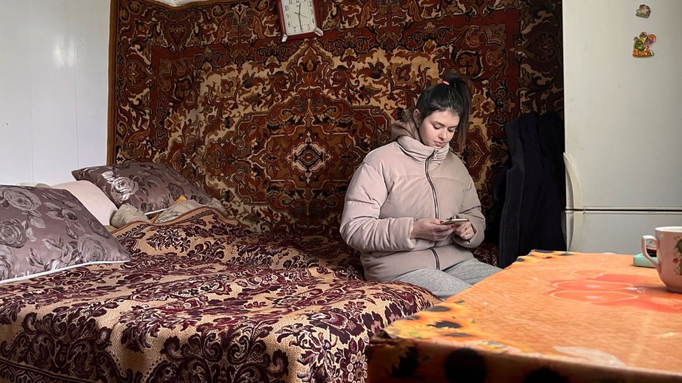 Two generations share bed after Russian advance