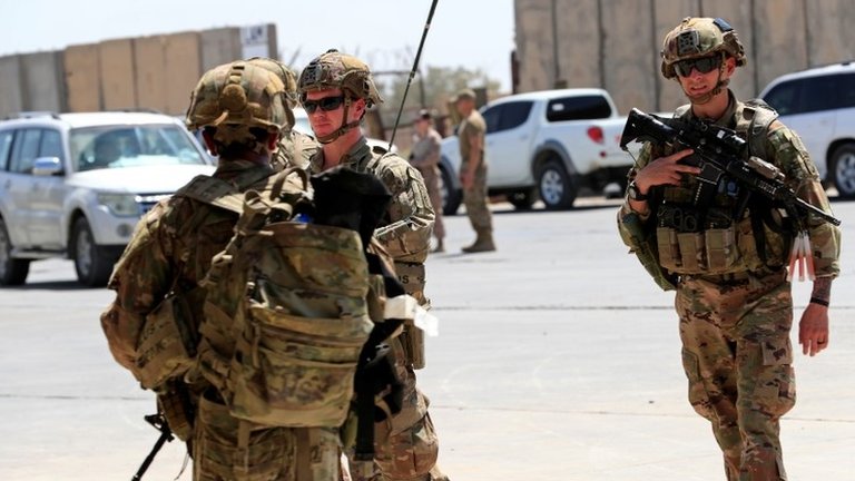 File photo showing US soldiers during a handover ceremony of Taji military base to Iraqi security forces (23 August 2020)