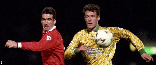 Man Utd's Eric Cantona and Norwich's Chris Sutton challenge for the ball in April 1993