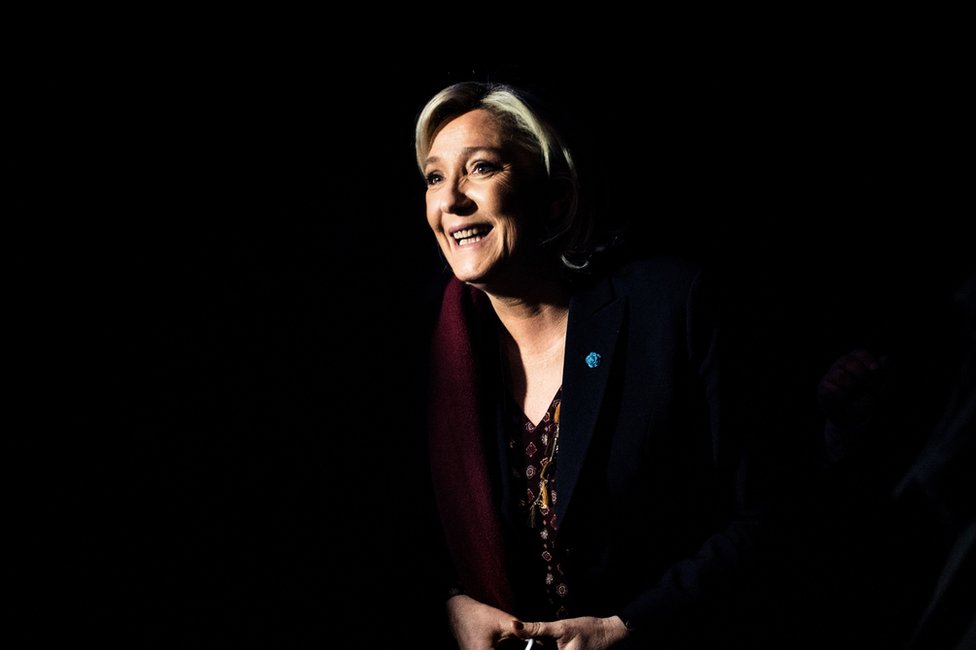 Marine Le Pen smiles as she attends a two-day political rally to kick off her presidential campaign in Lyon, 4 February