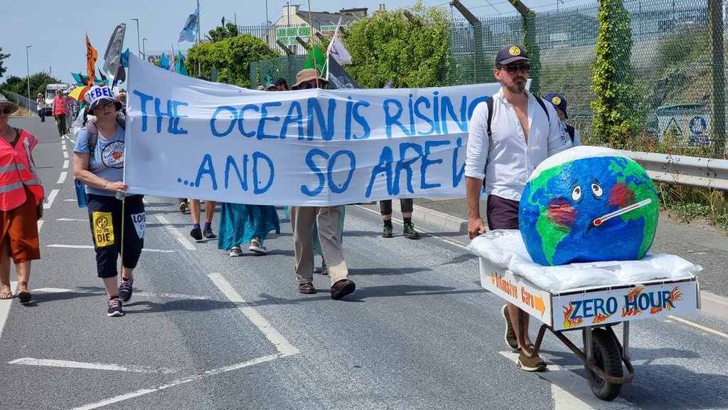 Protestors march on fuel depot despite injunction