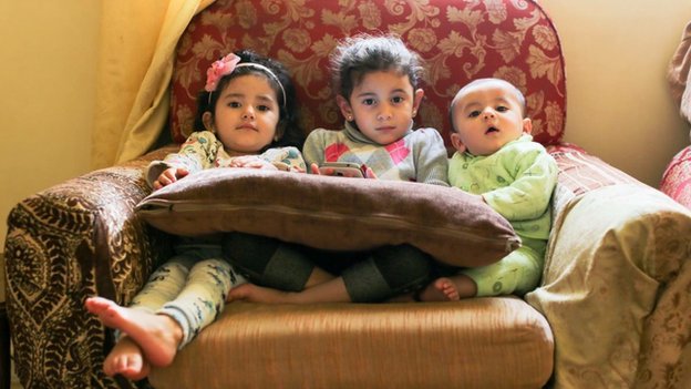 "They are too young now, but one day I will tell them about Syria. They are already asking questions. The oldest one overhears us talking on the phone to our family back in Syria. She asks us: 'If our aunt is hungry, why can't she just buy bread?'" (Amman, Jordan)