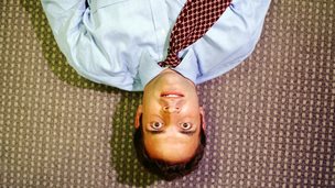 Businessman upside down