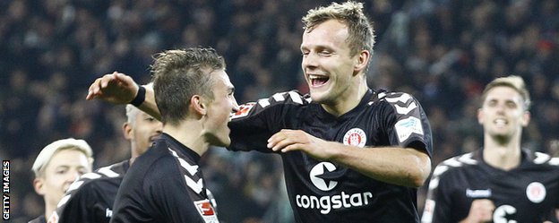 St Pauli's Lennart Thy (right) celebrates scoring against Fortuna Dusseldorf