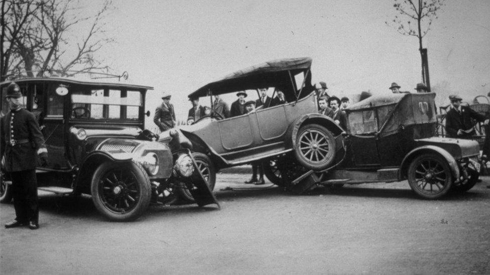 Old-fashioned cars in pile-up