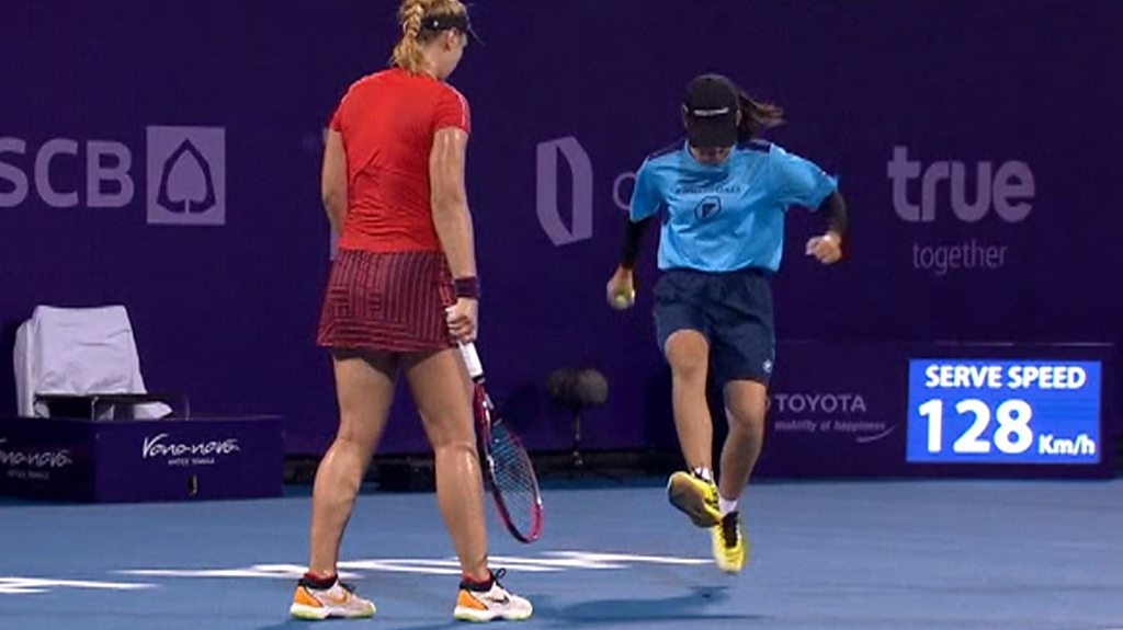 Ball girl shocks crowd with savage bug stamp