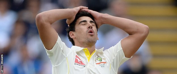 Mitchell Starc reacts after Brad Haddin drops Joe Root