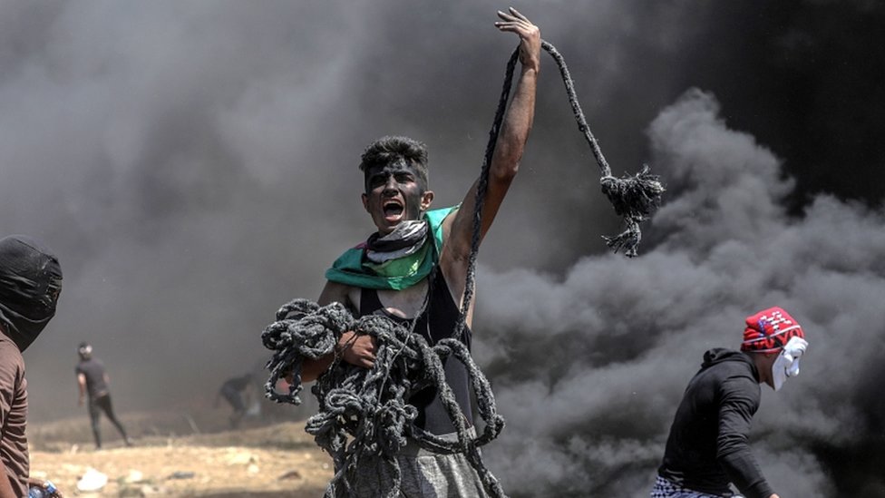 Gaza violence: Israel defends actions as 55 Palestinians killed
