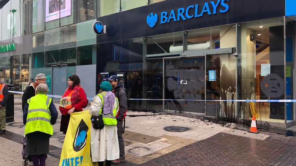 Barclays branch defaced in climate change protest