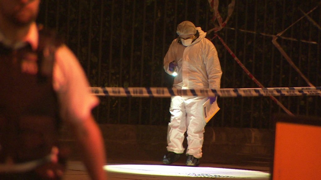 Woman killed and five hurt in knife attack