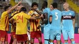 Birkirkara and West Ham players tussle during the match 