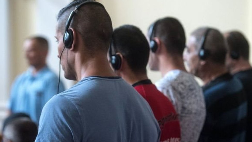 terdakwa penyelundup migran.