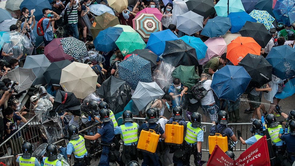Protesters clash with riot police on September 28, 2014 in Hong Kong