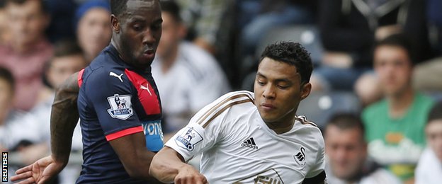 Swansea winger Jefferson Montero (right)