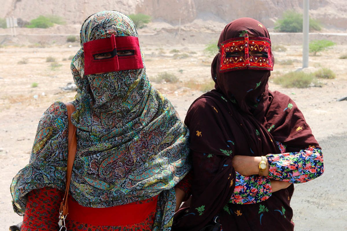 Shia Muslim Bandari women from southern Iran wearing embroidered Boregeh masks.