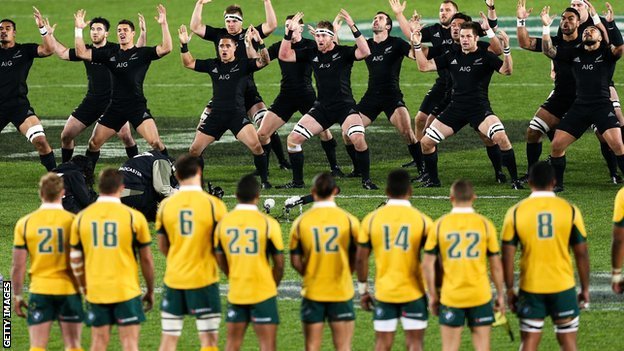 Australia look on as New Zealand perform the haka before they met this summer in Auckland