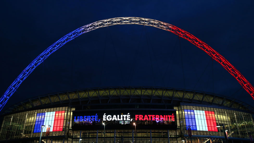 Wembley stadium is lit up in the French Tricolore in remembrance to the victims of last weeks terror attacks in Paris