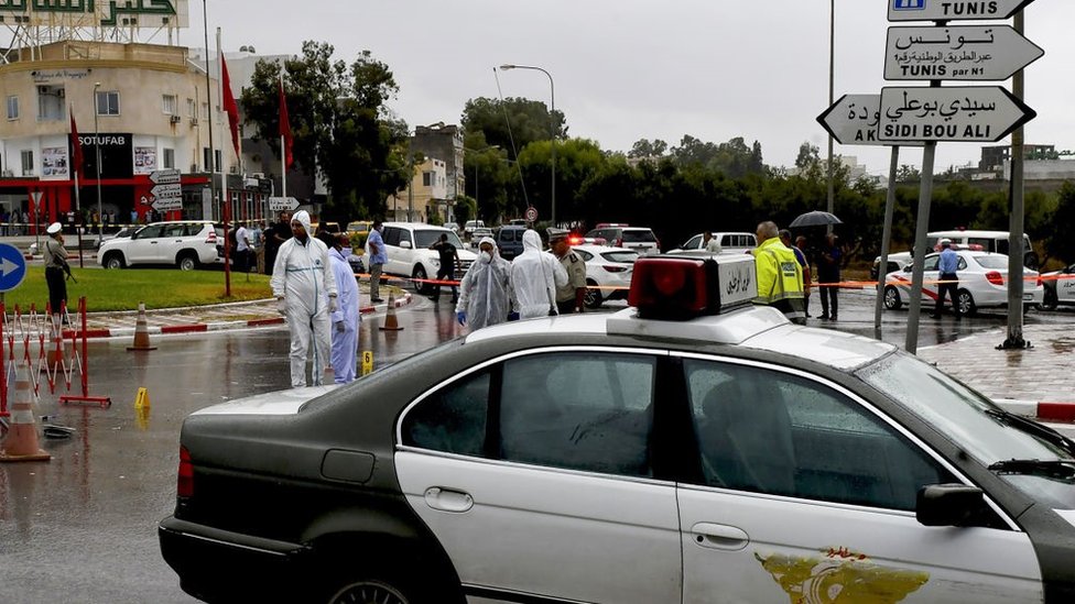 Tunisian forensic police investigate the site of an attack on Tunisian National Guard officers on September 6, 2021, in Sousse