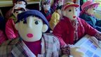 Scarecrows in a classroom in the Japanese village of Nagoro