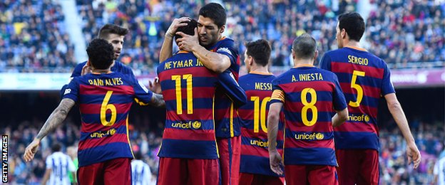 Barcelona's players celebrate a goal against Real Sociedad