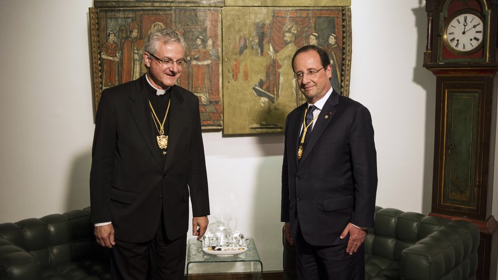 The Spanish Bishop of Urgell (l) and the president of France (r) are Andorra's co-princes and heads of state