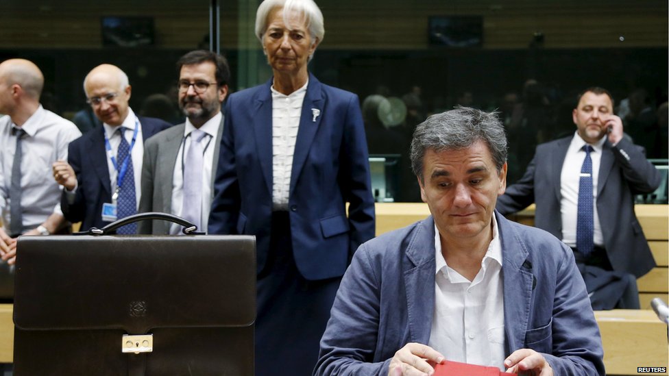 Greek Finance Minister Euclid Tsakalotos and International Monetary Fund (IMF) Managing Director Christine Lagarde (back C) attend an euro zone finance ministers meeting in Brussels, Belgium on 12 July 2015
