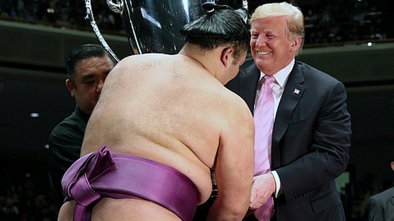 Donald Trump enjoys sumo tournament