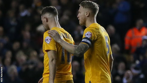 Alan Browne was consoled by captain Tom Clarke after scoring the decisive own goal