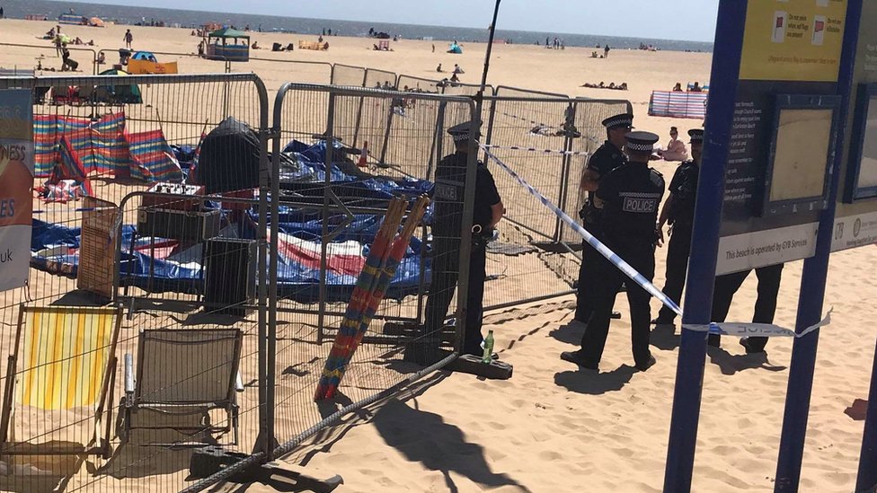 Girl dies after being thrown from 'exploding' bouncy castle on beach