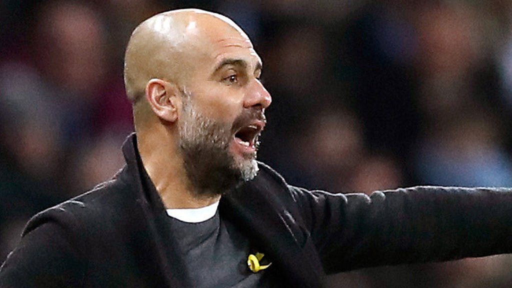 Guardiola fined for wearing yellow ribbon