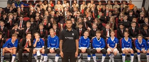 Southampton defender Ryan Bertrand posted this picture on Instagram after visiting a school, saying it reminded him of when he played for his own school growing up