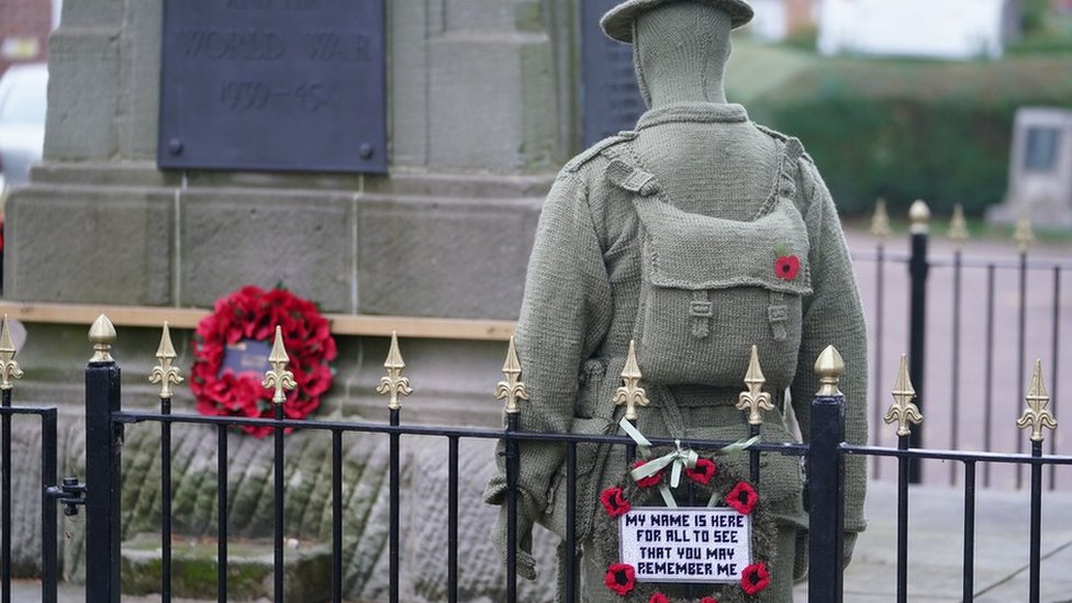 Remembrance Day Knitted soldier by 'knitting Banksy' appears at war