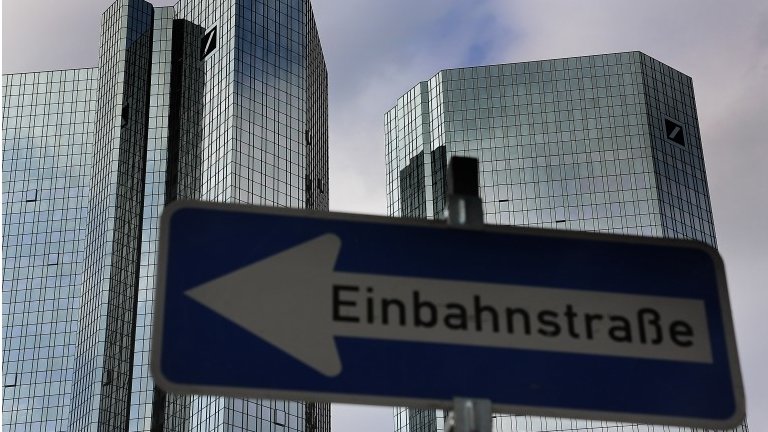 Deutsche Bank shares open at record lows in Europe