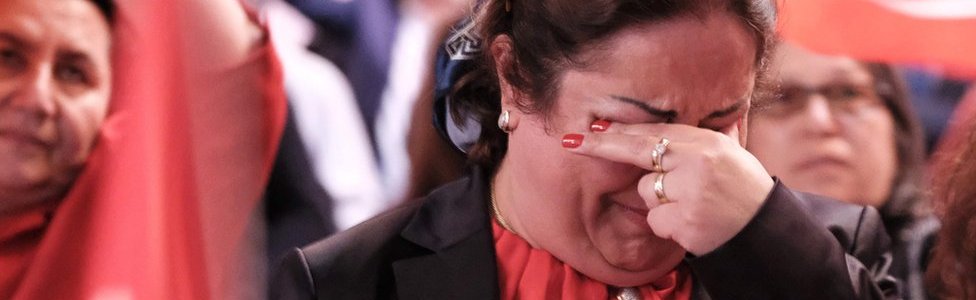 A woman weeps at a Republican People's Party meet in Berlin