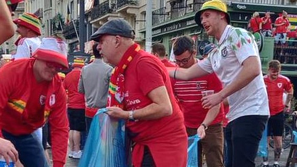 Wales fans praised for cleaning up before match