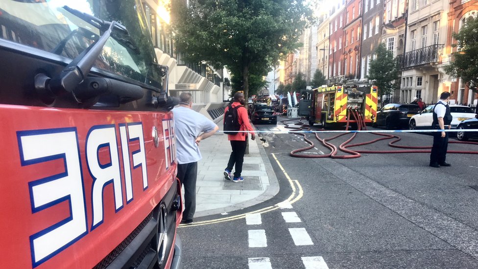 Fire breaks out at Harley Street block of flats in London