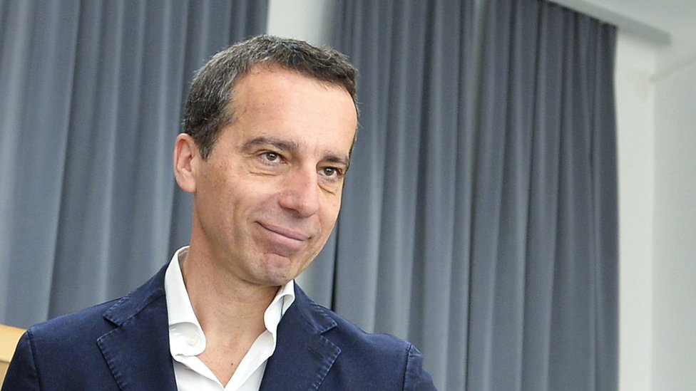 Austrian Chancellor Christian Kern votes in the second round of the presidential election on 23 May.