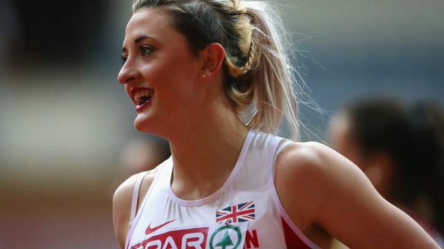 Lucy Hatton celebrates winning her heat in the Women's 100m hurdle