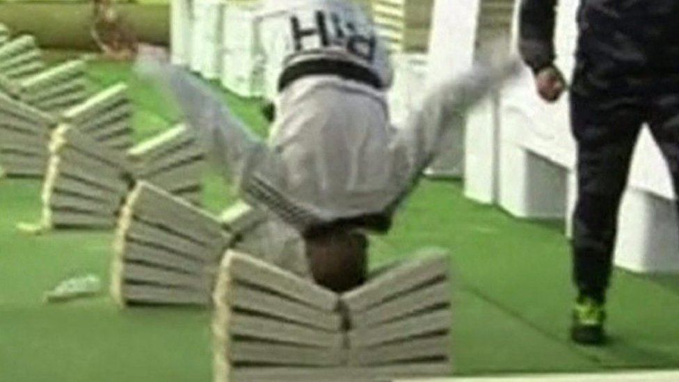 Bosnian man crushes concrete blocks with head