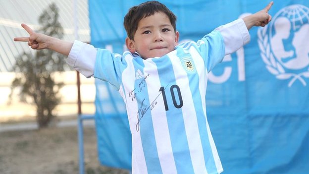 Murtaza and his signed Messi shirt