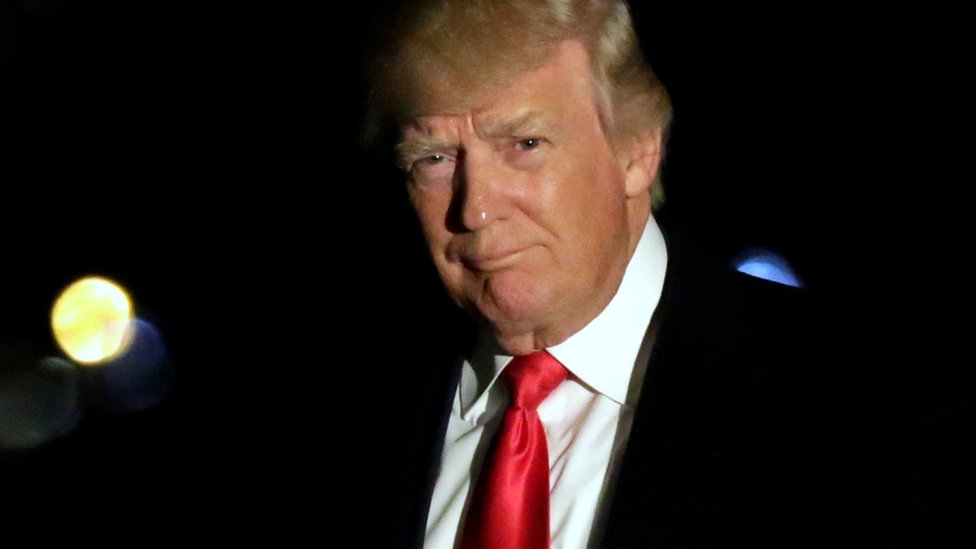 Menurut Amnesty, retorika kampanye Donald Trump sanga memecah belah dan berbahaya, dan kini malah diwujudkan.